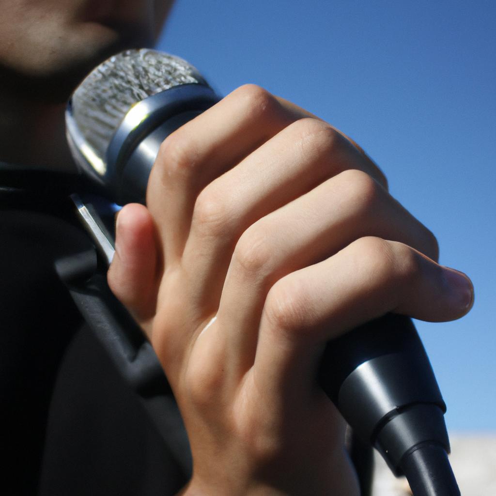 Person speaking into a microphone
